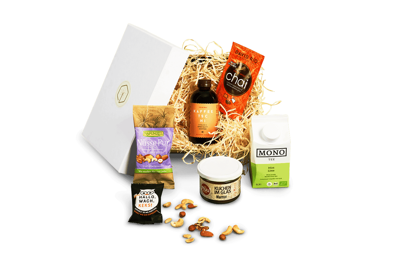The coffee box contains everything you need for a cosy coffee break: crunchy natural nuts, an activating Hallo.Wach.Keks!, a spicy chai blend and refreshing mint-lime tea. and of course a juicy marble cake and an invigorating cold-brew coffee.