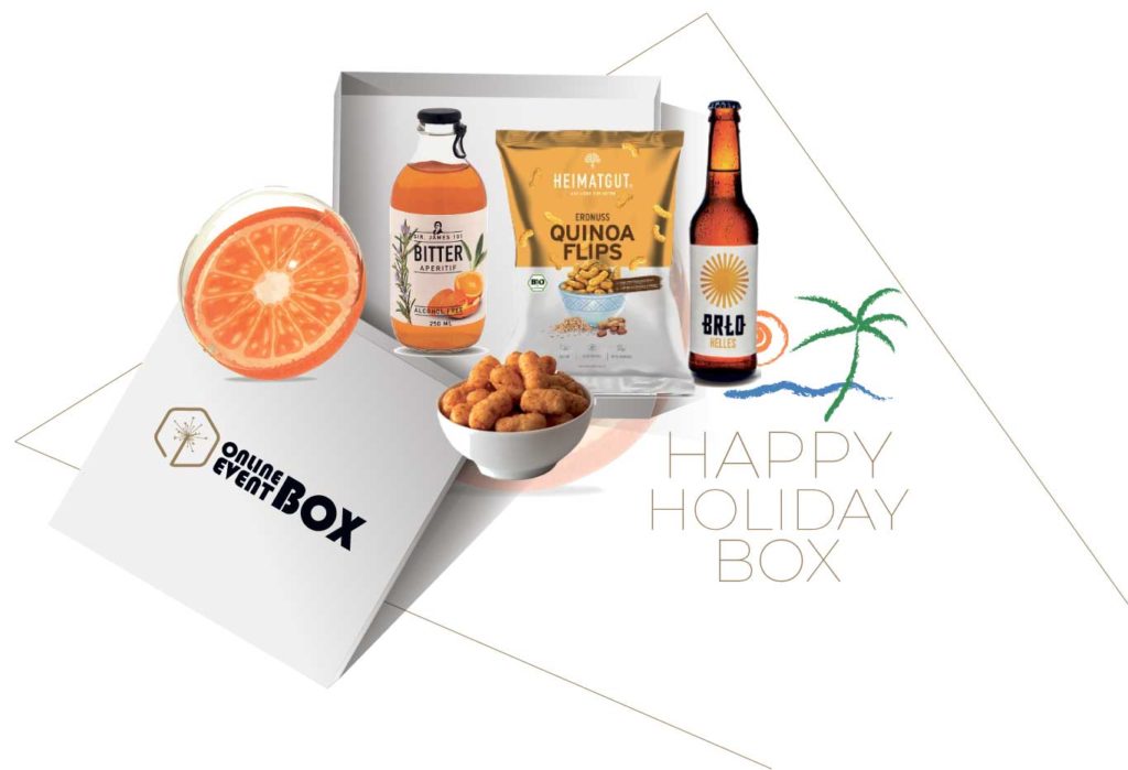 Unsere Happy Holiday Box beinhaltet einen alkoholfreien Bitter Aperitif, erfrischendes Helles, knusprige Quinoa Flips und einen sommerlichen Wasserball